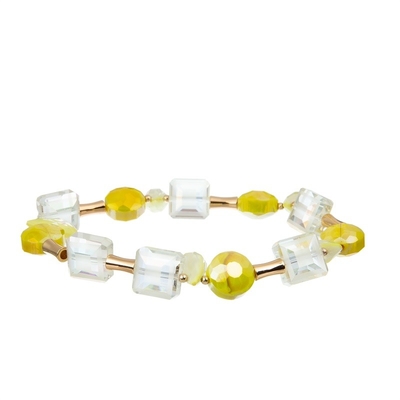 Paquet empilable élastique jaune de bracelet tissé par Boho de gland pendant des années de l'adolescence