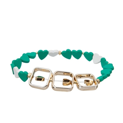 Le coeur peint d'hématite a perlé coloré réglable empilé de bracelet extensible