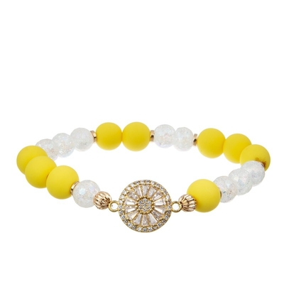 Paquet empilable élastique jaune de bracelet tissé par Boho de gland pendant des années de l'adolescence