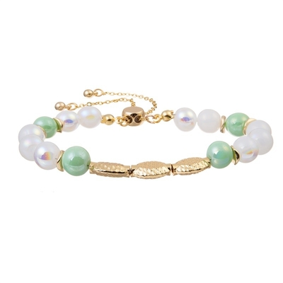 Le rond d'impression de léopard perle avec le cadeau réglable de fille de bracelet de perles en métal d'or