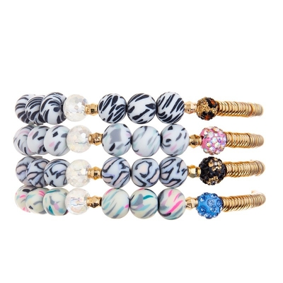 La silice de rayure de zèbre de barre en métal d'or perle l'ensemble fait main de bracelet extensible