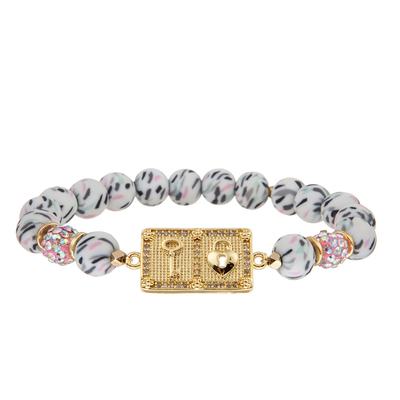 bracelets en pierre blancs noirs de bracelet de 8mm avec la serrure en forme de coeur plaquée par or