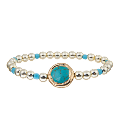 L'or fait main a plaqué le bracelet de cuivre élastique de perles d'hématite pour des femmes